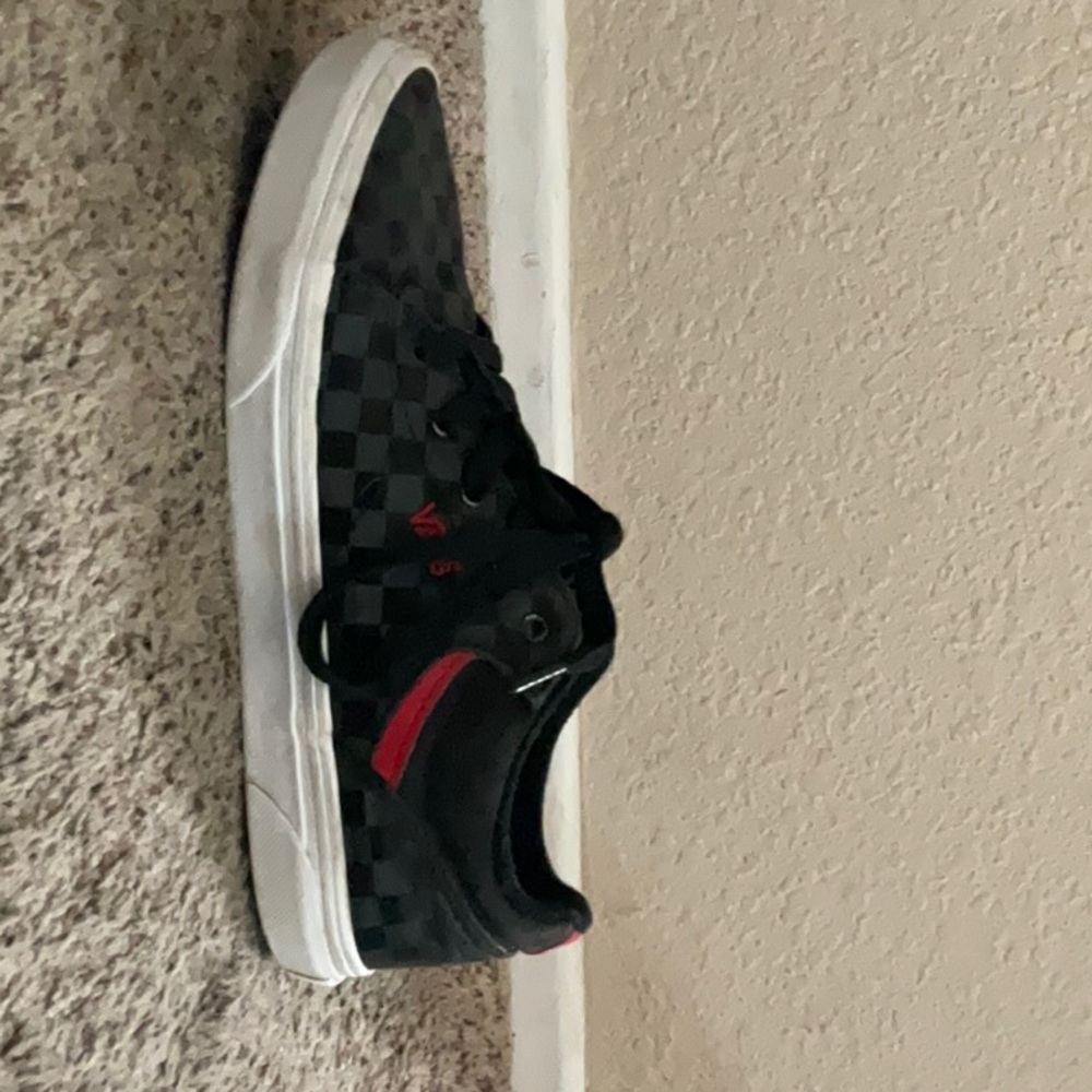 Vans, Grey, Black, and Red. Size 5.5. Used but in good condition.